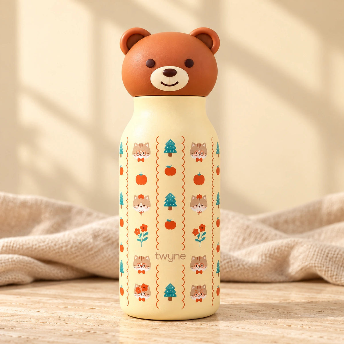 Twyne Bear bottle on linen